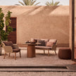 Elegant Suro Outdoor Sofa by Tribù with teak wood and braided rope | Casa Design Group