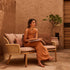 Elegant Suro Outdoor Sofa by Tribù with teak wood and braided rope | Casa Design Group