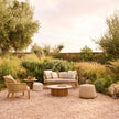 Elegant Suro Outdoor Sofa by Tribù with teak wood and braided rope | Casa Design Group