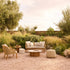 Elegant Suro Outdoor Sofa by Tribù with teak wood and braided rope | Casa Design Group