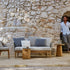 Tairu sculptural teak and lava stone side table by Tribù | Casa Design Group