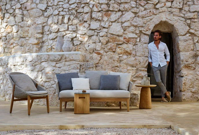Tairu sculptural teak and lava stone side table by Tribù | Casa Design Group