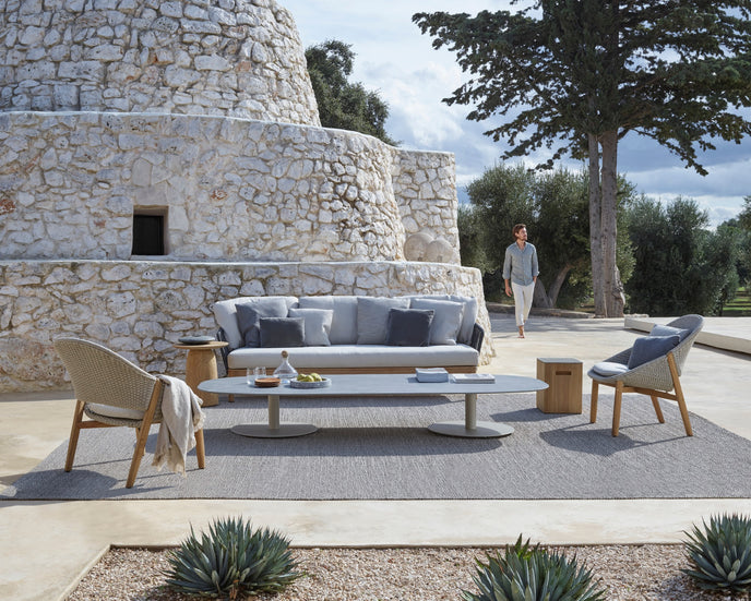 Tairu sculptural teak and lava stone side table by Tribù | Casa Design Group