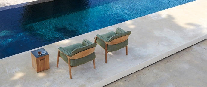 Tairu sculptural teak and lava stone side table by Tribù | Casa Design Group