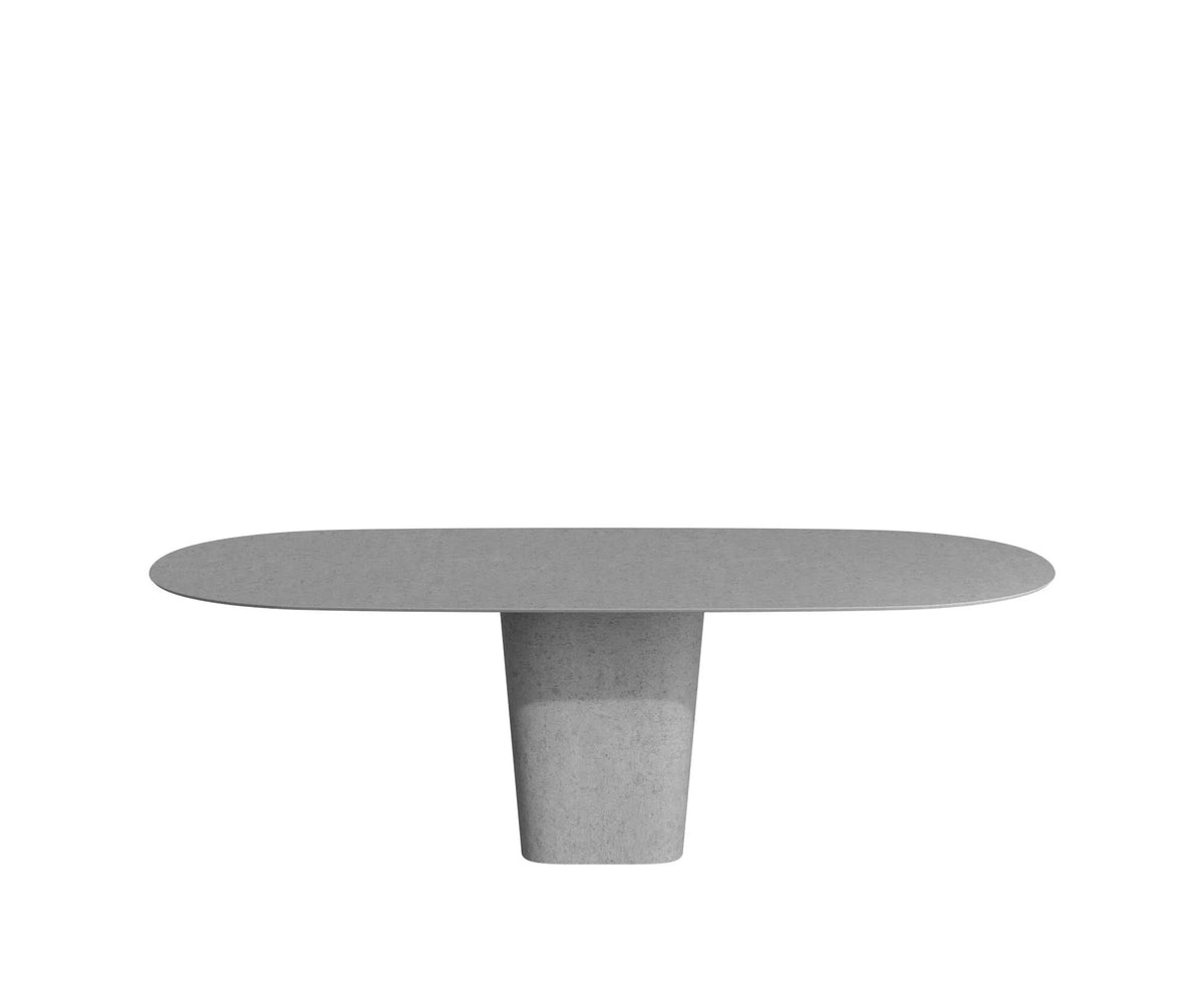 Tao Oval Outdoor Dining Table by Tribù with sculptural pedestals and refined concrete top | Casa Design Group