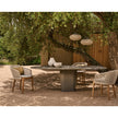 Tao Oval Outdoor Dining Table by Tribù with sculptural pedestals and refined concrete top | Casa Design Group