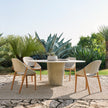 Tao Round Outdoor Dining Table by Tribù with sculptural pedestals and refined concrete top | Casa Design Group.