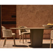 Tao Round Outdoor Dining Table by Tribù with sculptural pedestals and refined concrete top | Casa Design Group.