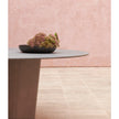 Tao Outdoor Dining Table by Tribù with sculptural pedestals and refined concrete top | Casa Design Group