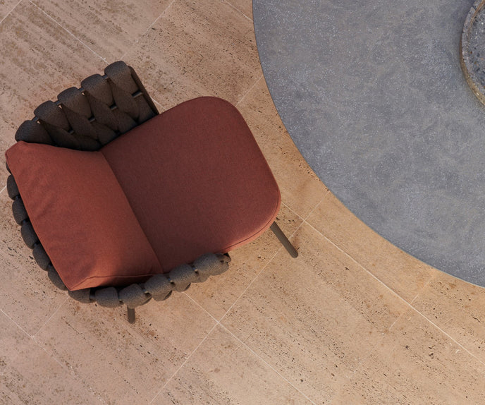 Tao Round Outdoor Dining Table by Tribù with sculptural pedestals and refined concrete top | Casa Design Group.