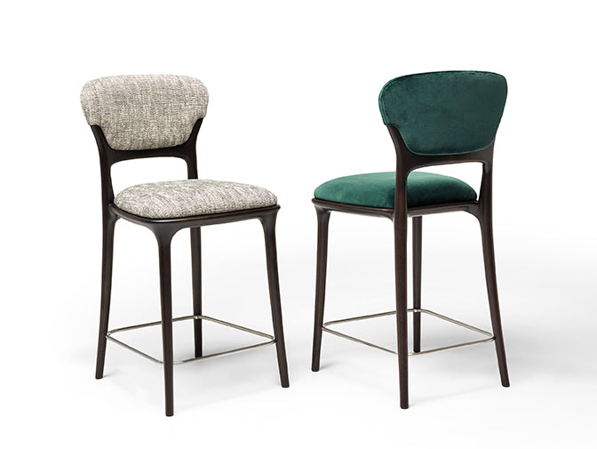 Teresa Bar Stool with curved upholstered backrest, solid wood frame and satin steel footrest by Ceccotti Collezioni | Casa Design Group