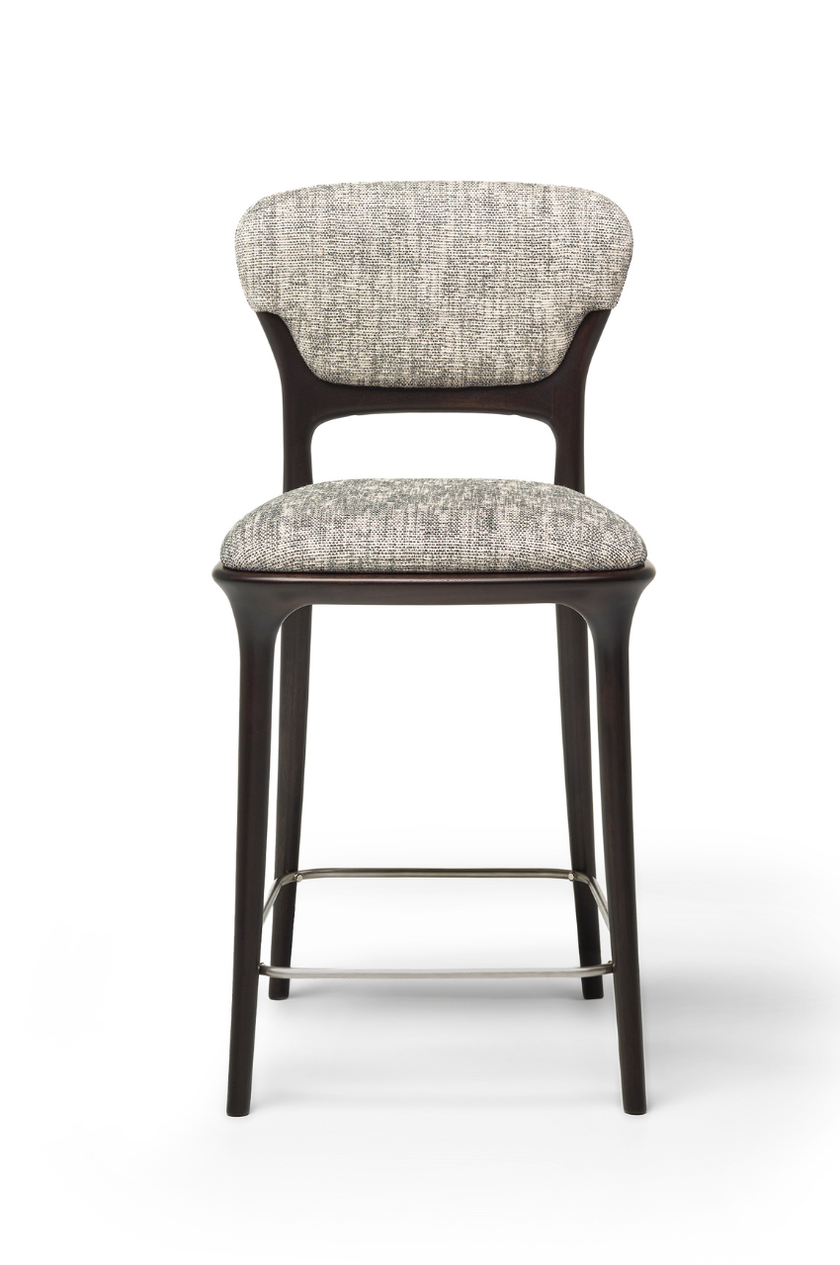Teresa Bar Stool with curved upholstered backrest, solid wood frame and satin steel footrest by Ceccotti Collezioni | Casa Design Group