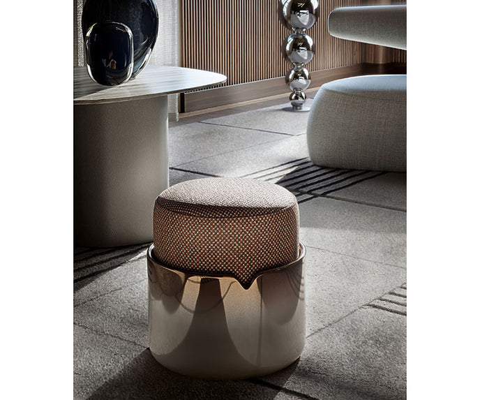 Teti elegant upholstered pouf by Giorgetti with lacquered or leather-wrapped base | Casa Design Group
