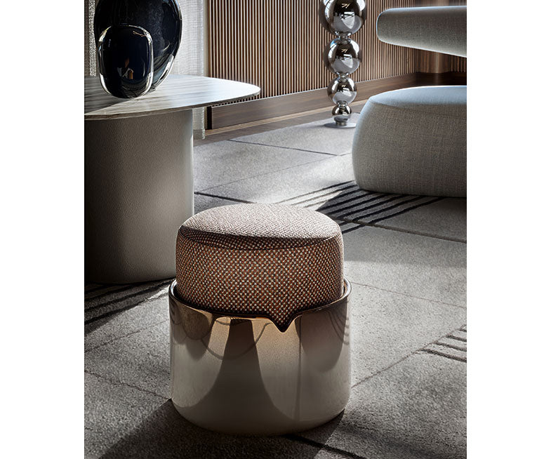 Teti elegant upholstered pouf by Giorgetti with lacquered or leather-wrapped base | Casa Design Group