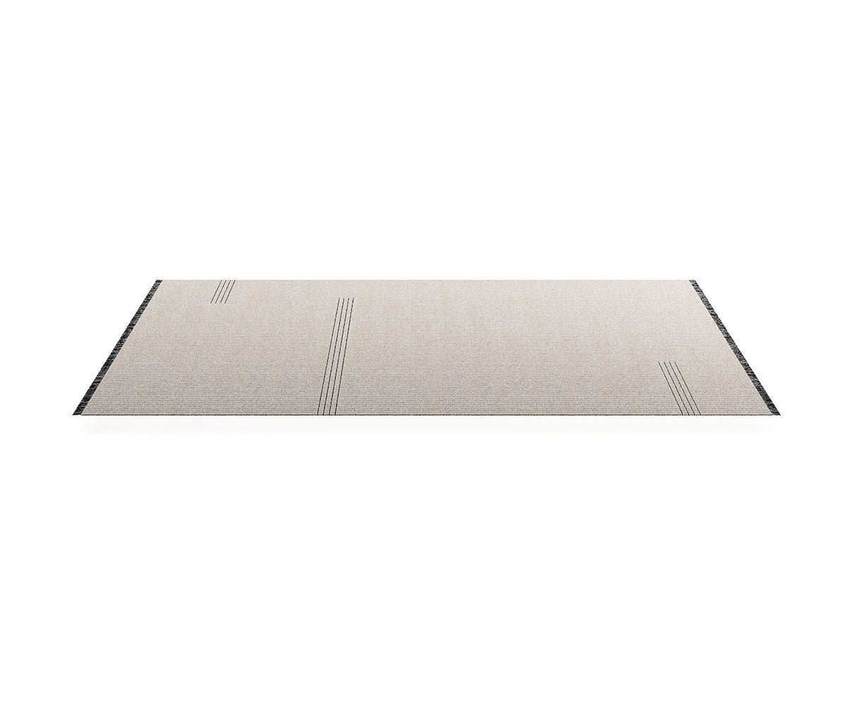 Frigerio Theo Rug with hand-tufted texture and refined geometric detailing for luxury interiors Casa Design Group