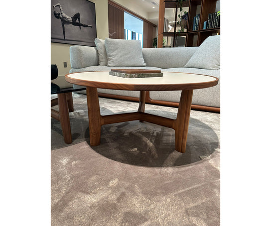 Tillow floor sample coffee table by Porada with Canaletta walnut base and Cuoietto leather top | Casa Design Group