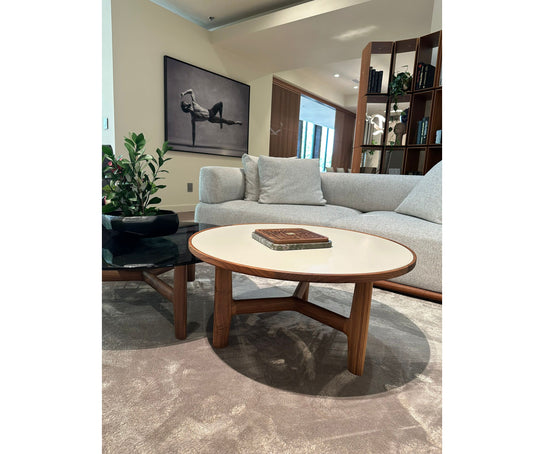 Tillow floor sample coffee table by Porada with Canaletta walnut base and Cuoietto leather top | Casa Design Group