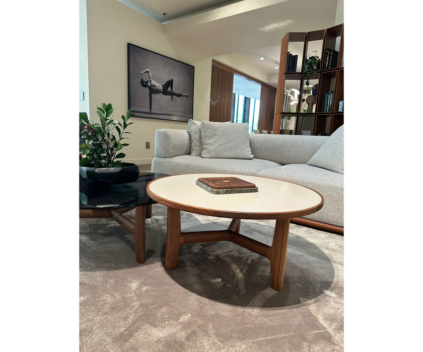 Tillow floor sample coffee table by Porada with Canaletta walnut base and Cuoietto leather top | Casa Design Group