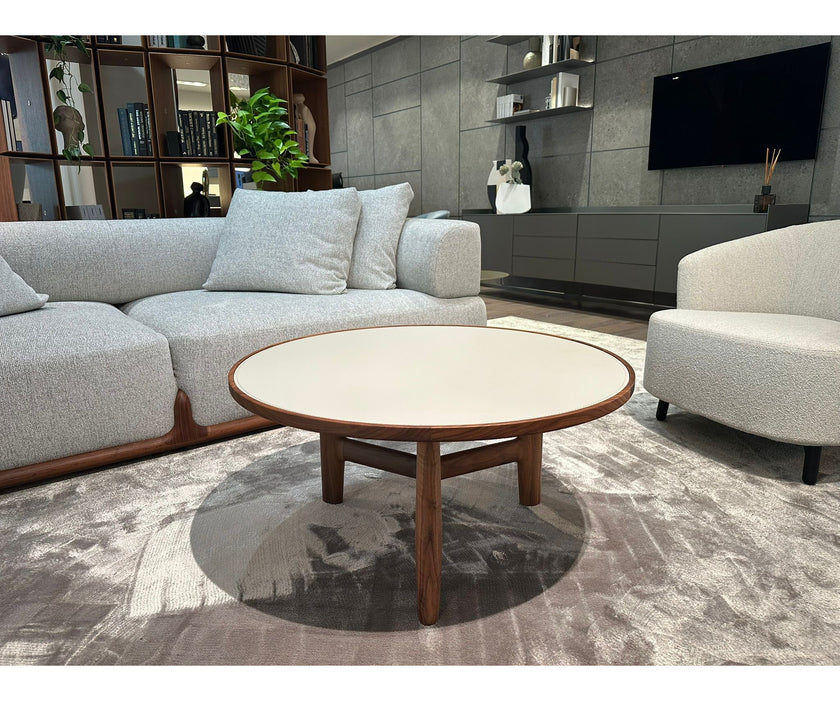 Tillow floor sample coffee table by Porada with Canaletta walnut base and Cuoietto leather top | Casa Design Group