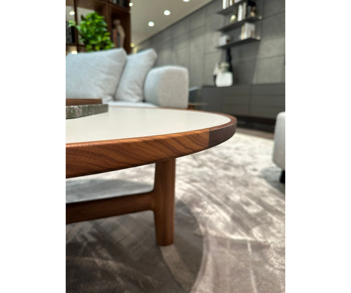 Tillow floor sample coffee table by Porada with Canaletta walnut base and Cuoietto leather top | Casa Design Group