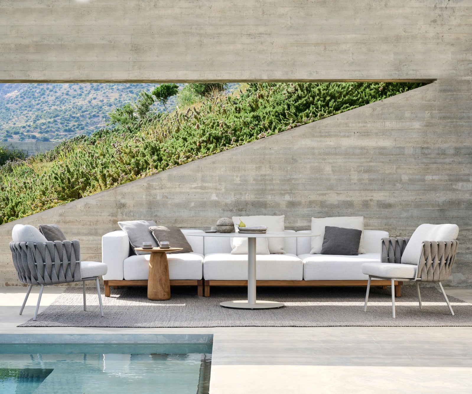 Stylish Tosca Low Lounge Chair by Tribù for outdoor relaxation | Casa Design Group