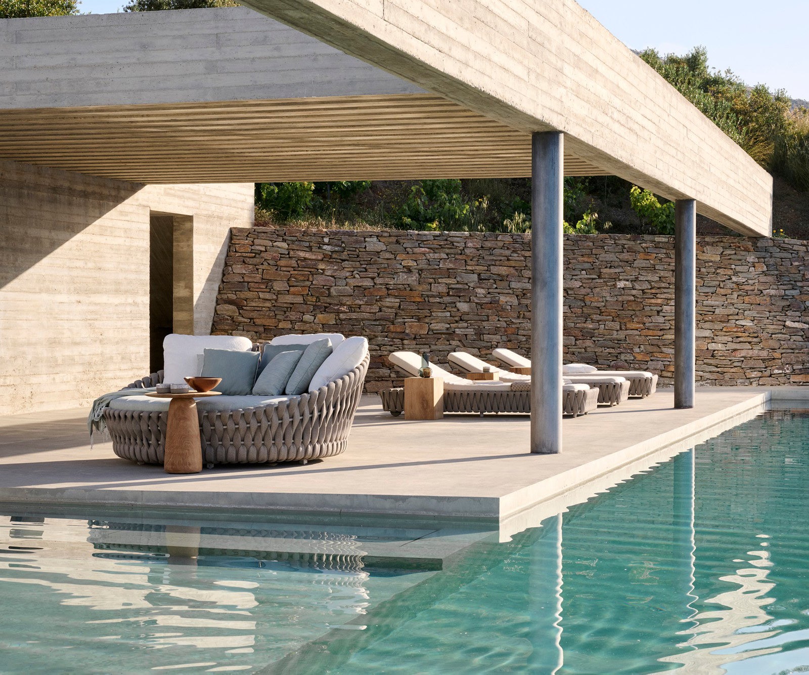 Elegant Tosca Outdoor Daybed by Tribù Featuring Rounded Forms and Plush Cushions | Casa Design Group