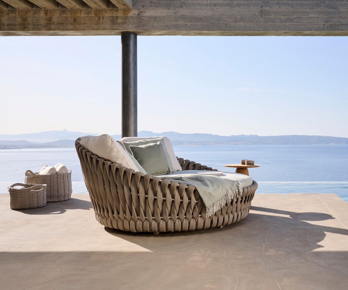 Elegant Tosca Outdoor Daybed by Tribù Featuring Rounded Forms and Plush Cushions | Casa Design Group