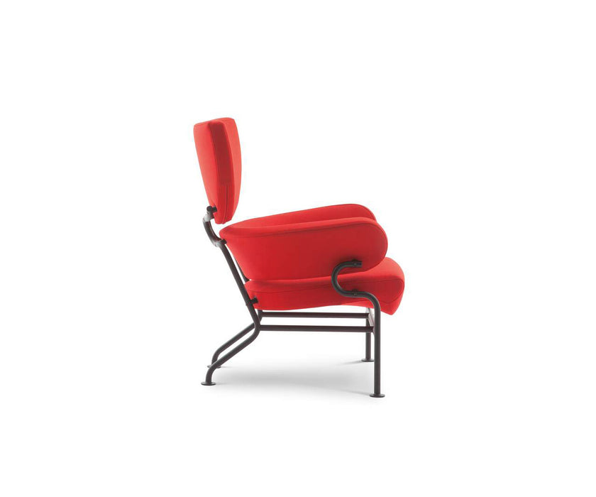 Tre Pezzi Lounge Chair by Cassina designed by Franco Albini with a sculptural upholstered wingback design.