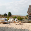 Teak and glass outdoor lanterns by Tribù Studio | Casa Design Group
