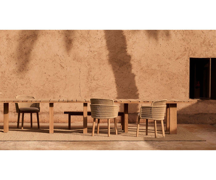 Vis À Vis Outdoor Bench by Tribù, crafted durable teak for stylish outdoor comfort | Casa Design Group