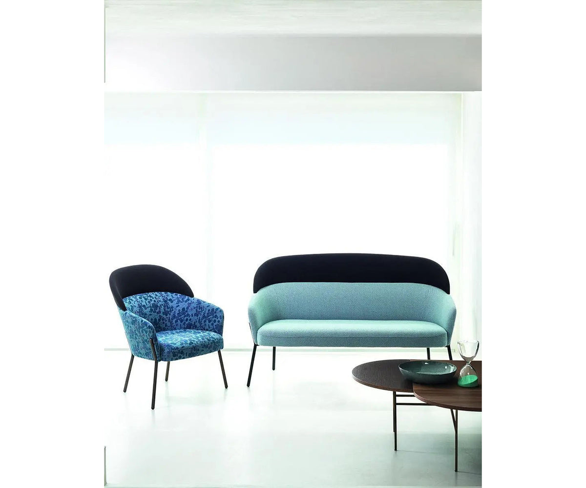 Wam 1577 Sofa by Bross with high upholstered backrest and metal frame Casa Design Group