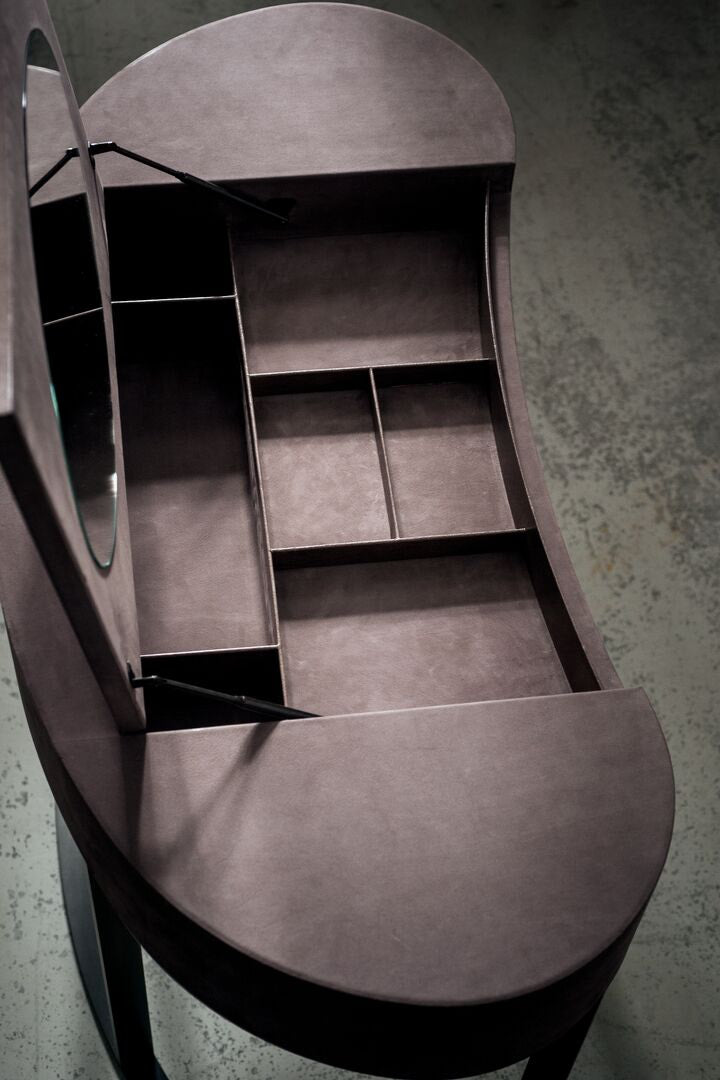 Yves leather vanity with oval mirror by Roberto Lazzeroni for Baxter | Casa Design Group