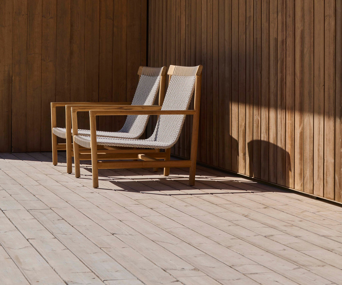 Elegant Amanu Lounge Chair by Tribù with teak frame and hemp seat | Casa Design Group