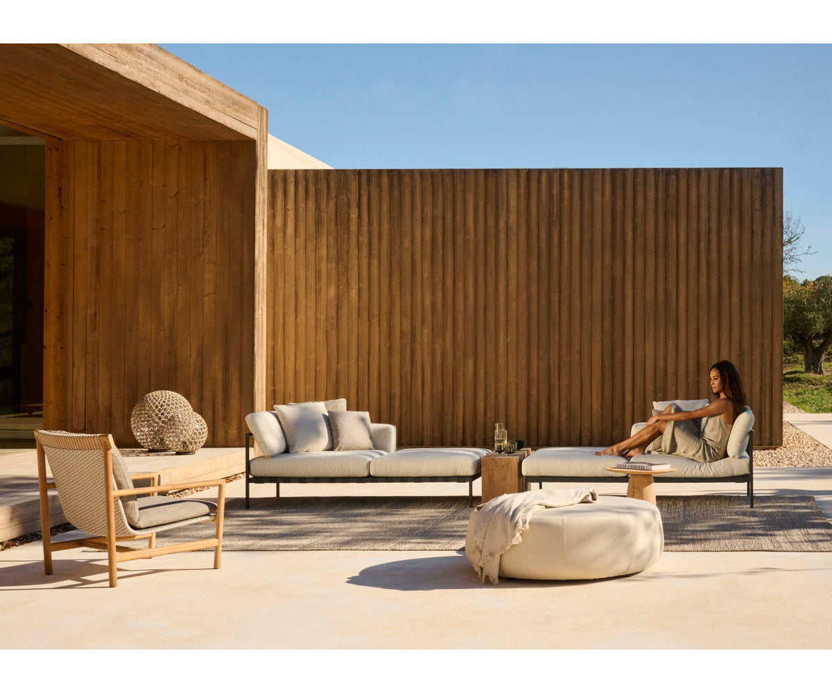 Elegant Amanu Lounge Chair by Tribù with teak frame and hemp seat | Casa Design Group