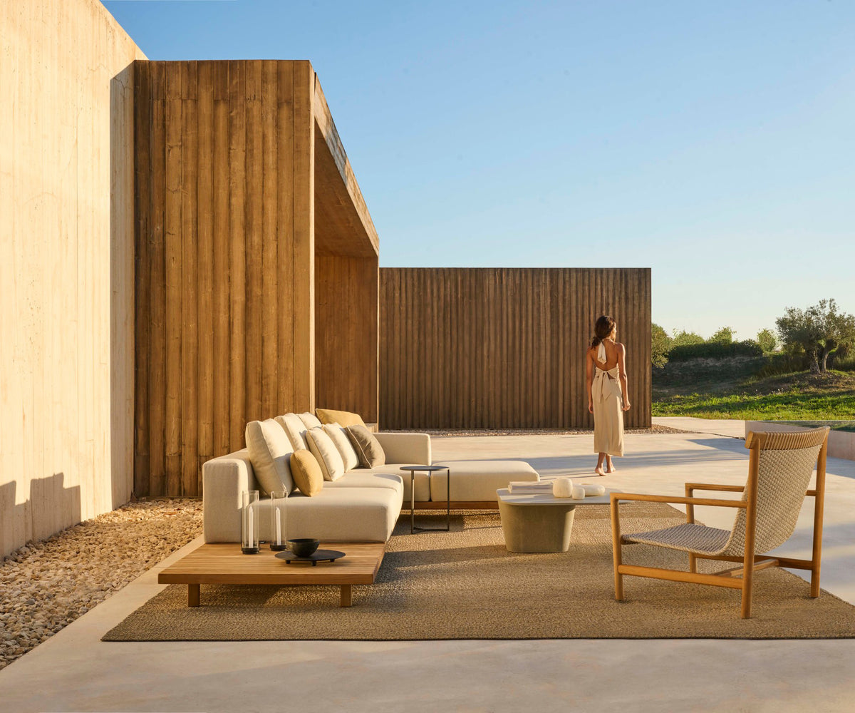 Elegant Amanu Lounge Chair by Tribù with teak frame and hemp seat | Casa Design Group