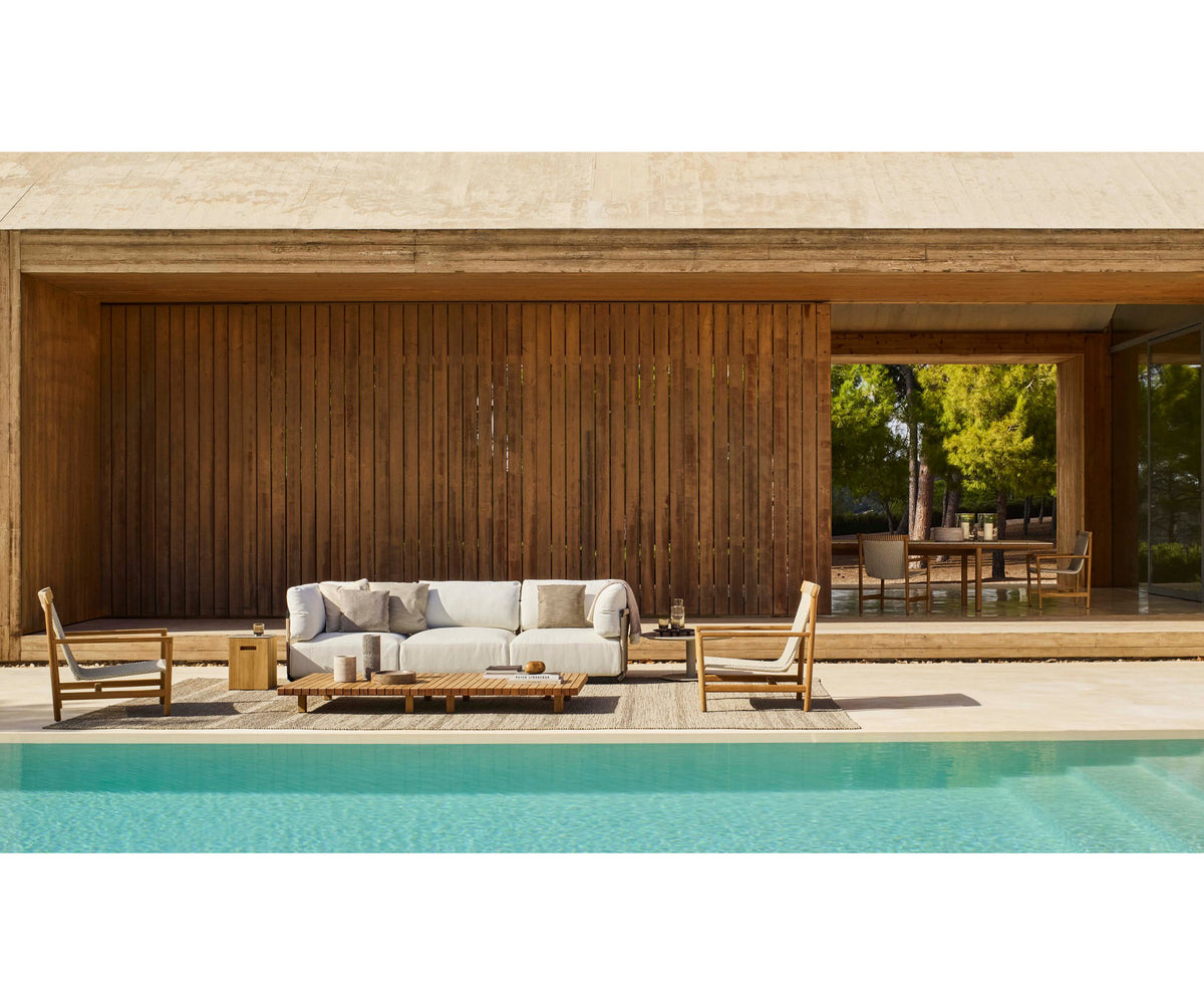 Elegant Amanu Lounge Chair by Tribù with teak frame and hemp seat | Casa Design Group