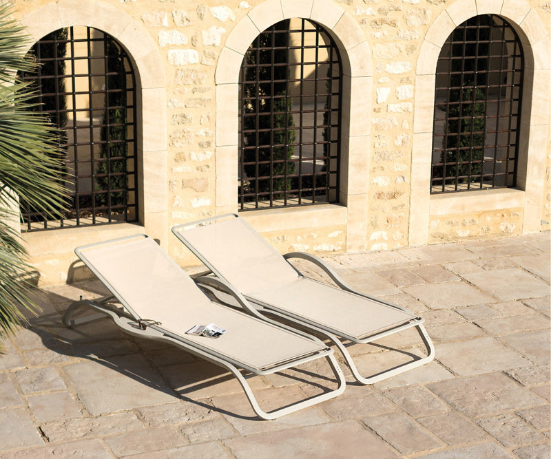 High end Marumi Sunlounger with Arm and Tray by Ego Paris Casa Design