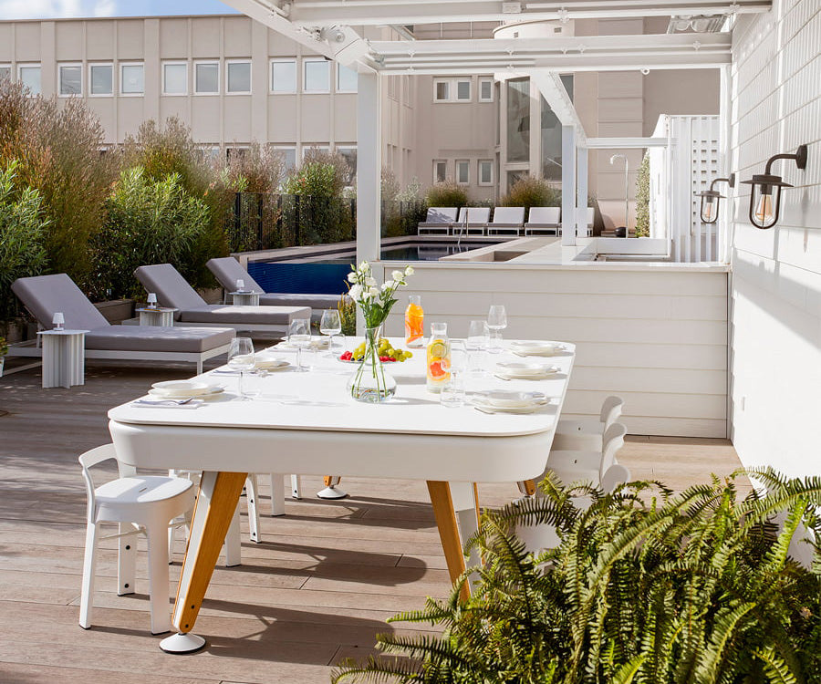 Diagonal convertible pool and dining table by RS Barcelona for modern spaces Casa Design Group