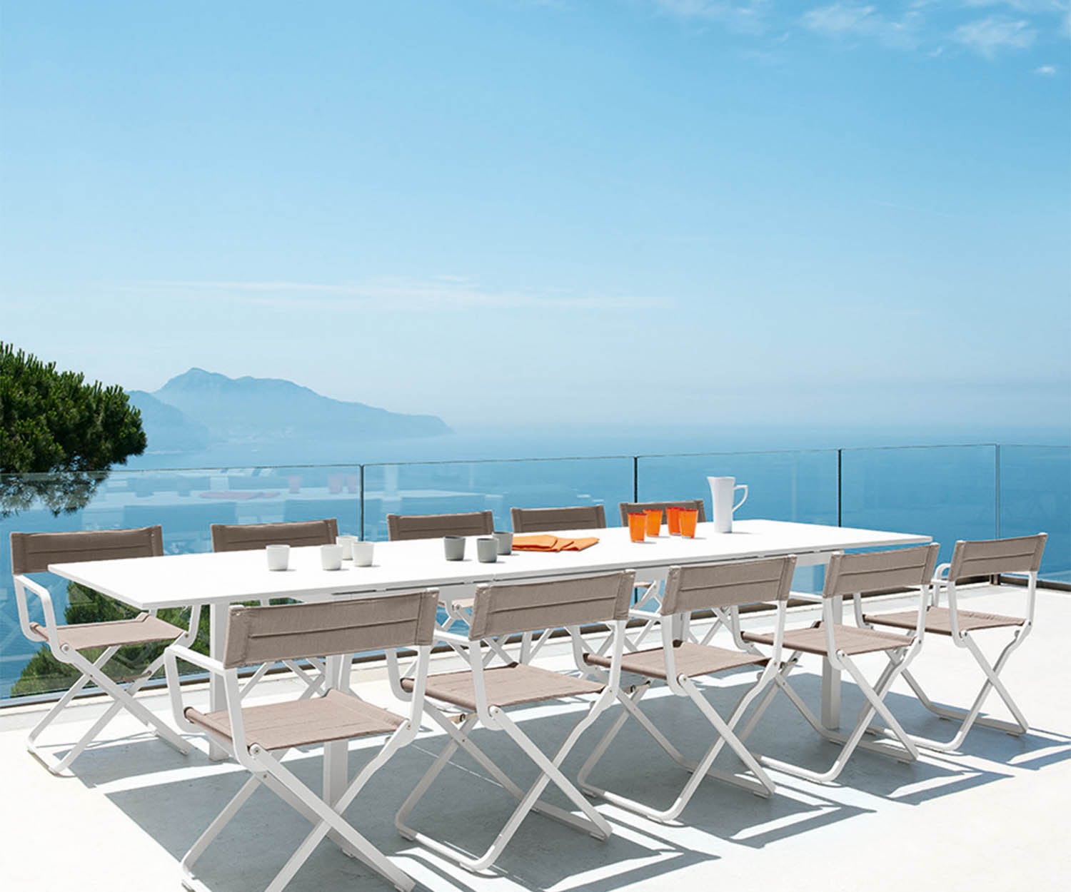 High End Flat Extending Rectangle Dining Table by Ethimo Casa Design Group