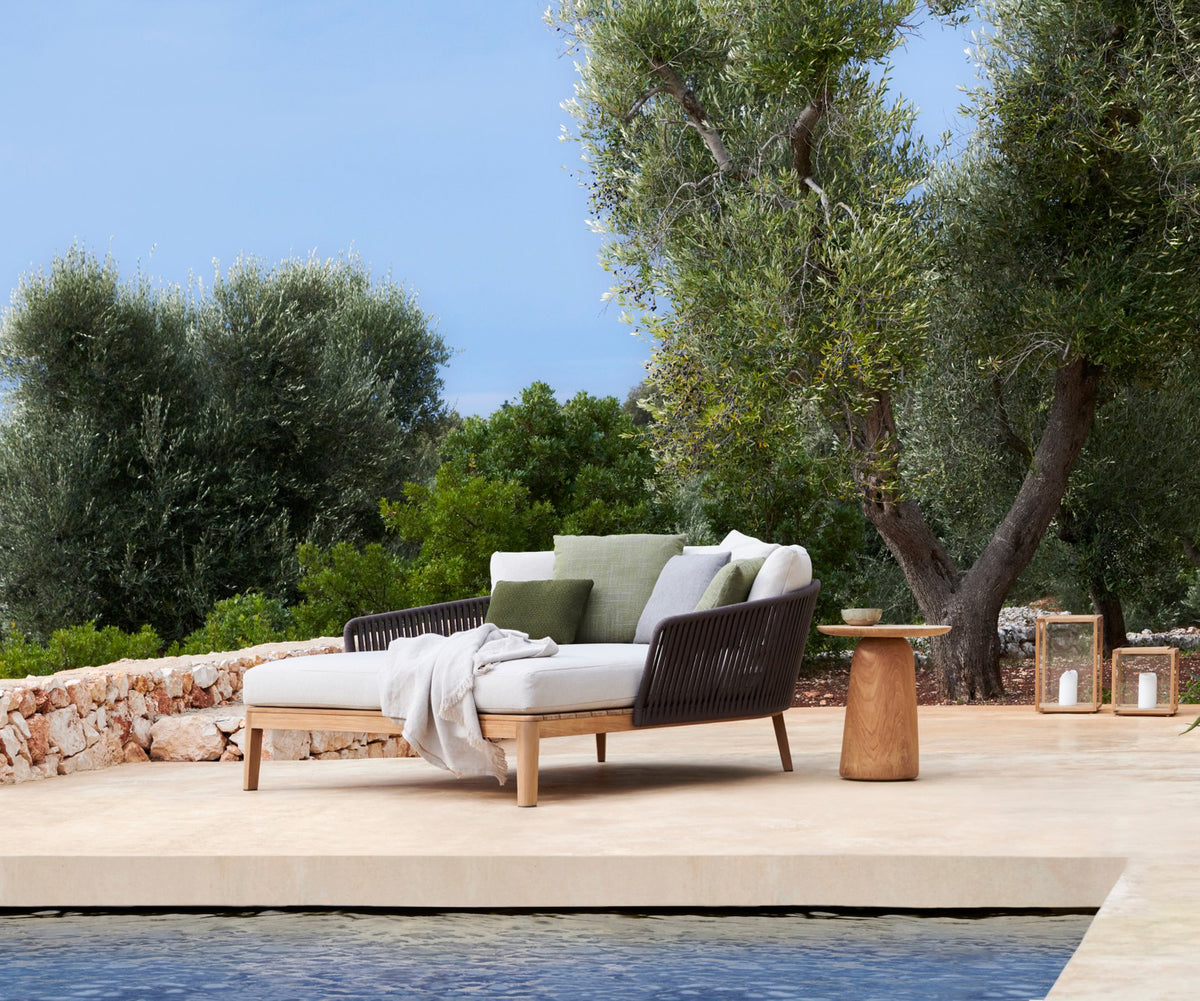 Stylish Mood Outdoor Daybed in teak with Handwoven Backrest, Designed for a Cozy Outdoor Retreat | Casa Design Group