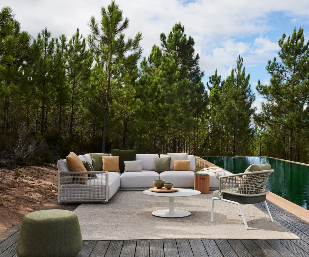 Contemporary Nodi Outdoor Sofa by Tribù with stainless steel frame and plush cushions | Casa Design Group