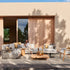 Contemporary Nodi Outdoor Sofa by Tribù with stainless steel frame and plush cushions | Casa Design Group