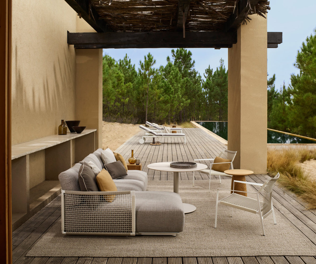 Contemporary Nodi Outdoor Sofa by Tribù with stainless steel frame and plush cushions | Casa Design Group