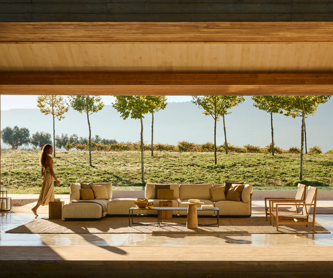 Contemporary Nodi Outdoor Sofa by Tribù with stainless steel frame and plush cushions | Casa Design Group