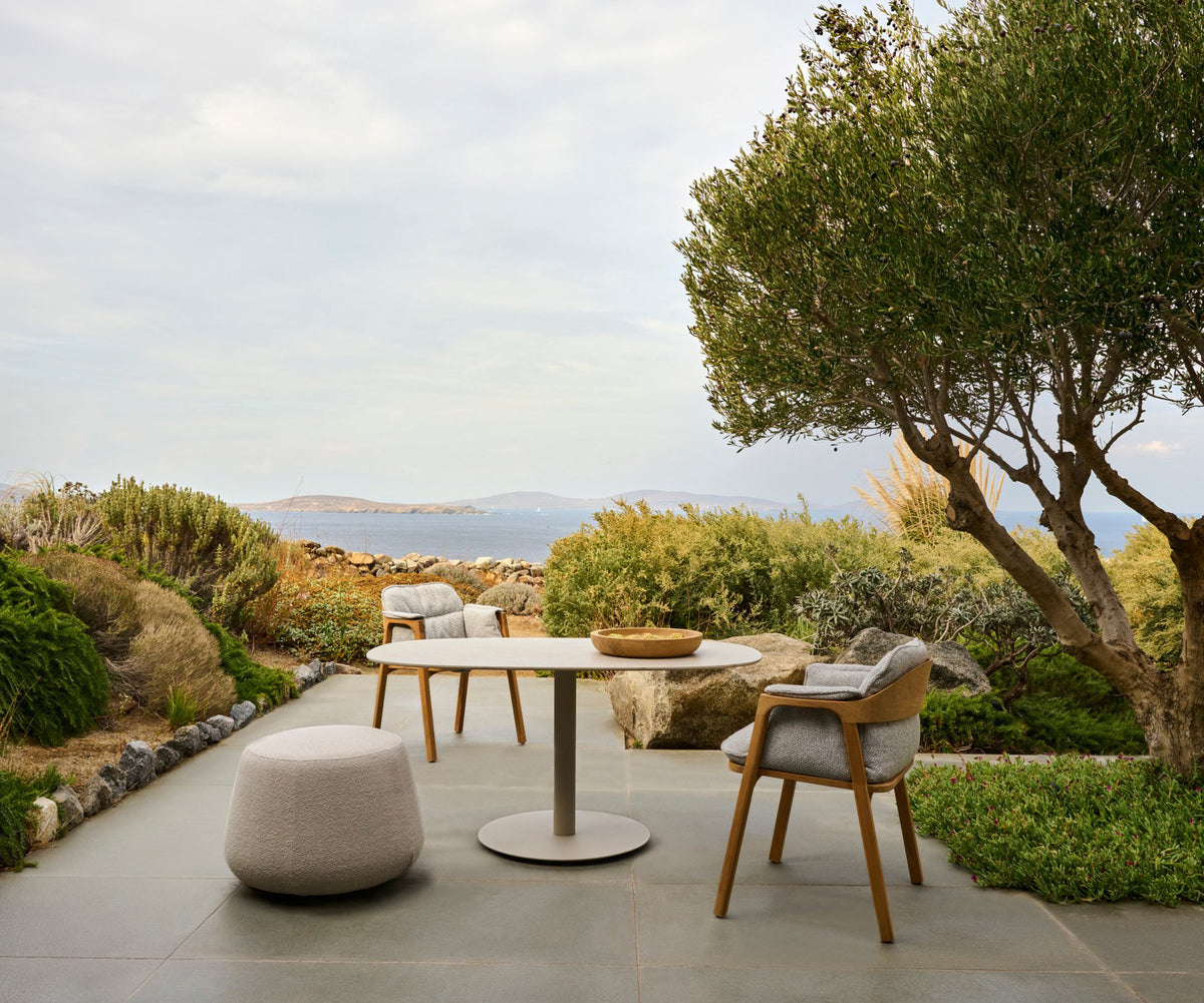 Luxury Nomad Outdoor Dining Chair by Tribù for high-end outdoor elegance | Casa Design Group