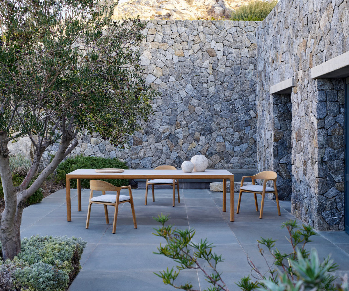 Luxury Nomad Outdoor Dining Chair by Tribù for high-end outdoor elegance | Casa Design Group