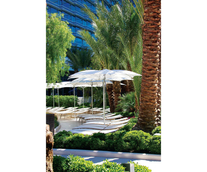 Modern Tuuci Ocean Master M1 Crescent Umbrella, polished rib details and elegant canopy – Casa Design Group