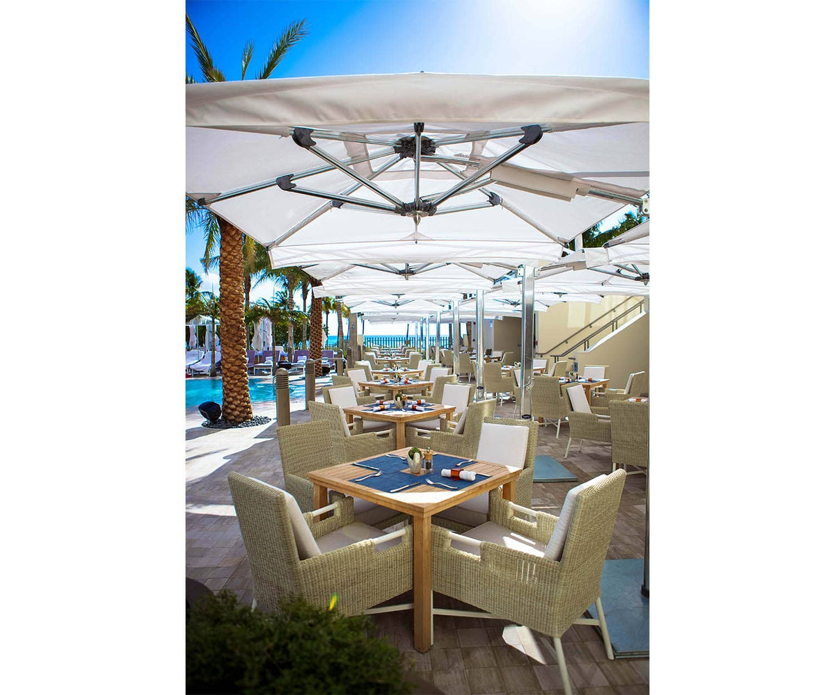 Luxury dual parasol by Tuuci with elegant marine-grade design – Casa Design Group