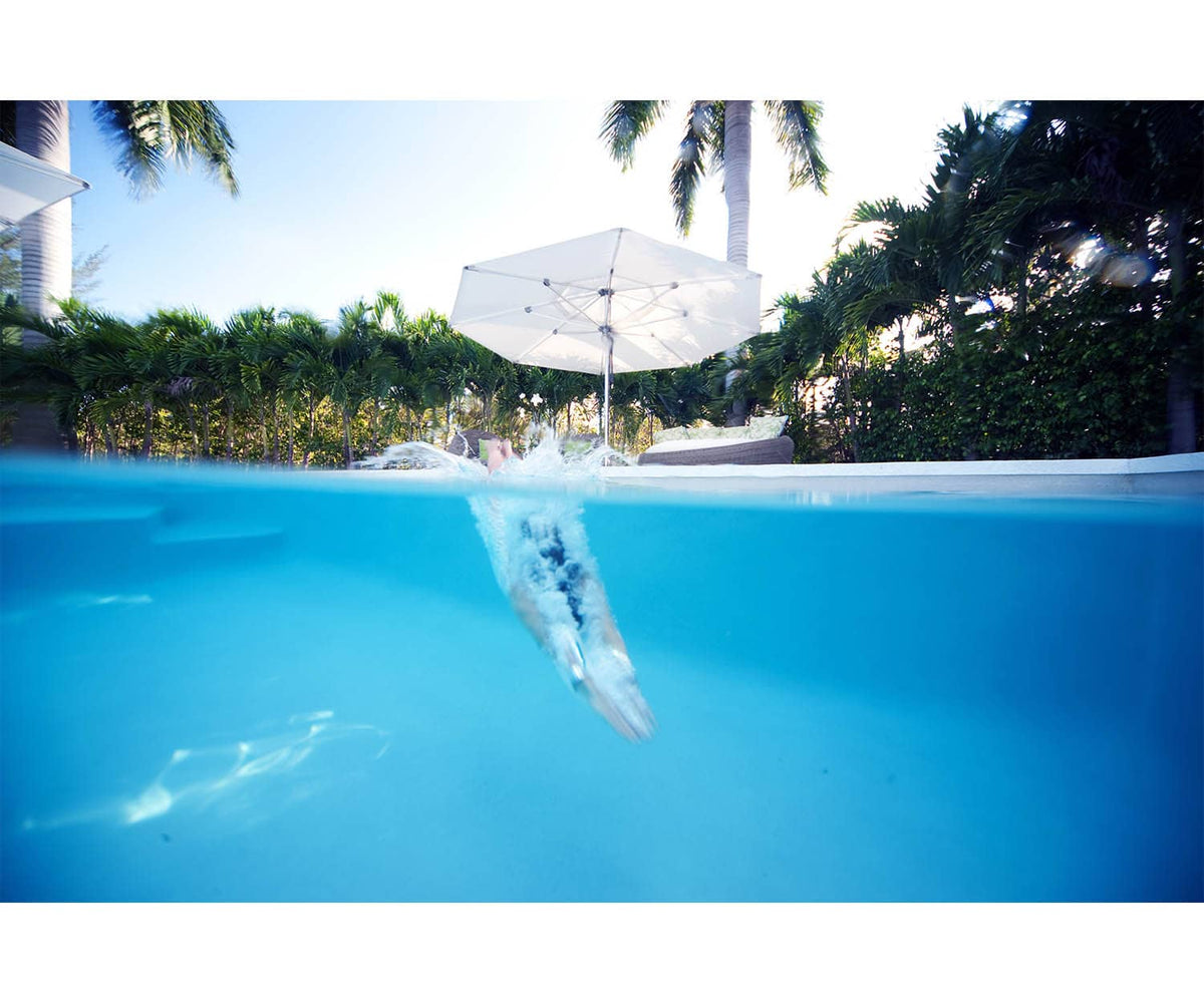 Elegant outdoor umbrella by Tuuci, durable and designed for beachfront properties | Casa Design Group