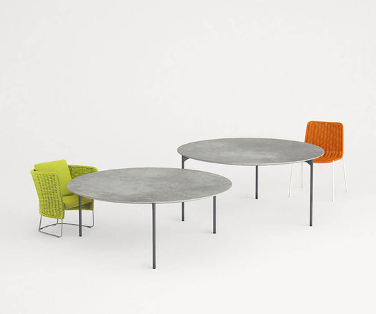 Modern Plano Outdoor Round Dining Table by Paola Lenti Handcrafted  Concrete Top with Steel Base Casa Design Group
